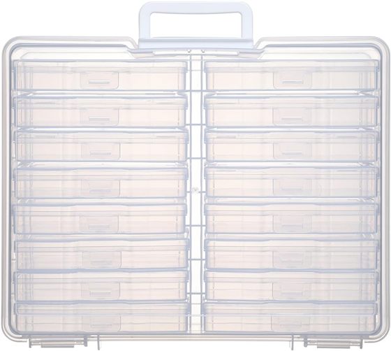 The sixteen clear inner cases in their carry box